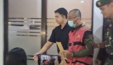 Salah satu tersangka saat digiring petugas ke rumah tahanan